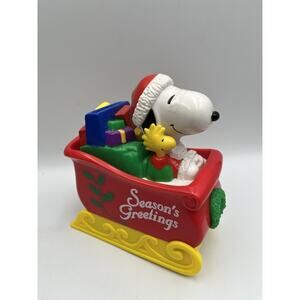Vintage Whitman’s Candies Christmas Peanuts Snoopy Santa Sled Coin Bank